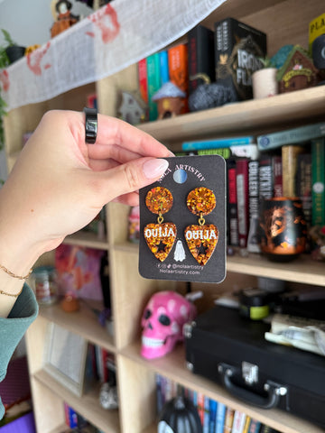 Orange ouija planchette earrings