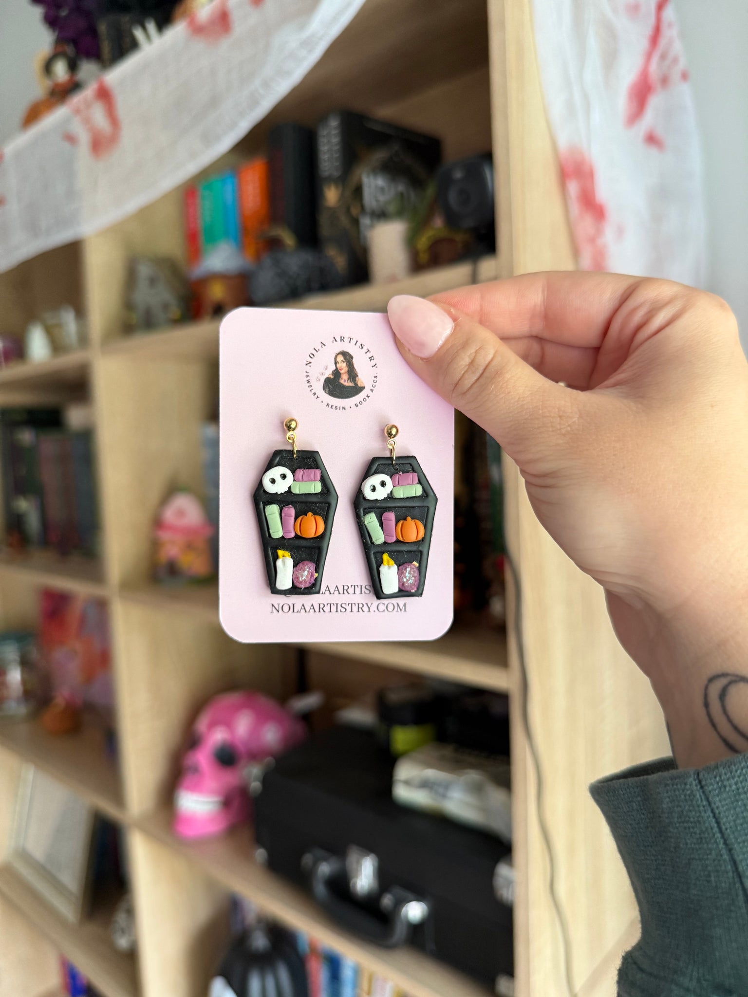 Spooky bookshelf earrings