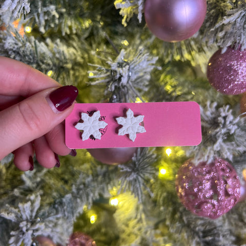 White snowflake studs