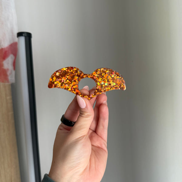 Orange glitter page holder