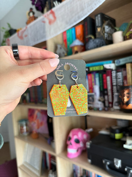 Orange glittery coffin huggie earrings