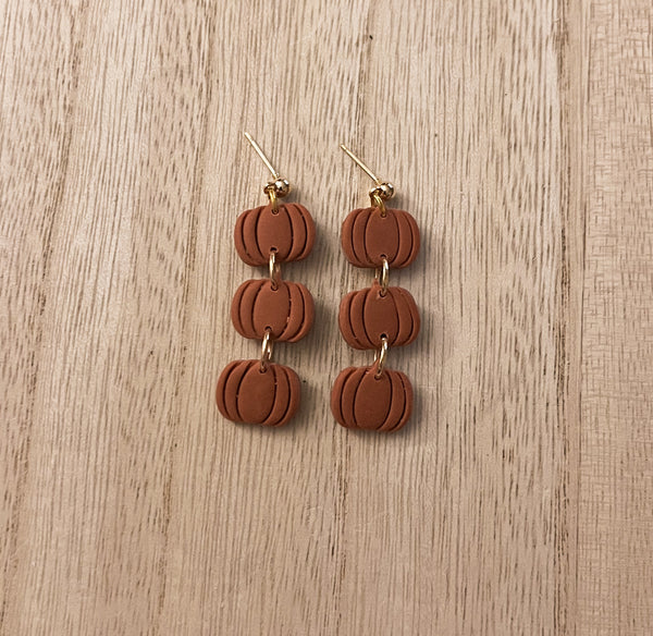 Dark orange pumpkin trio