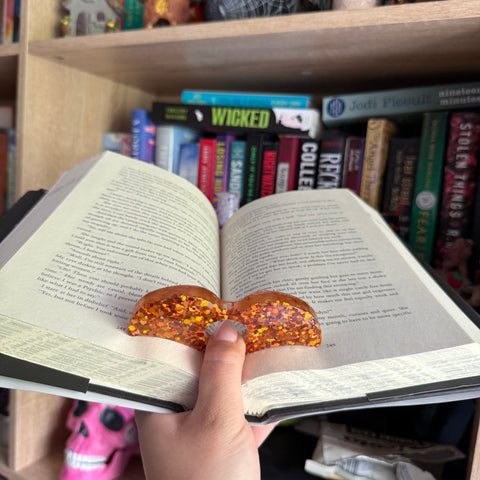 Orange glitter page holder