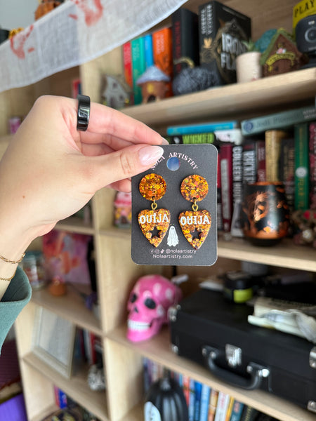 Orange ouija planchette earrings