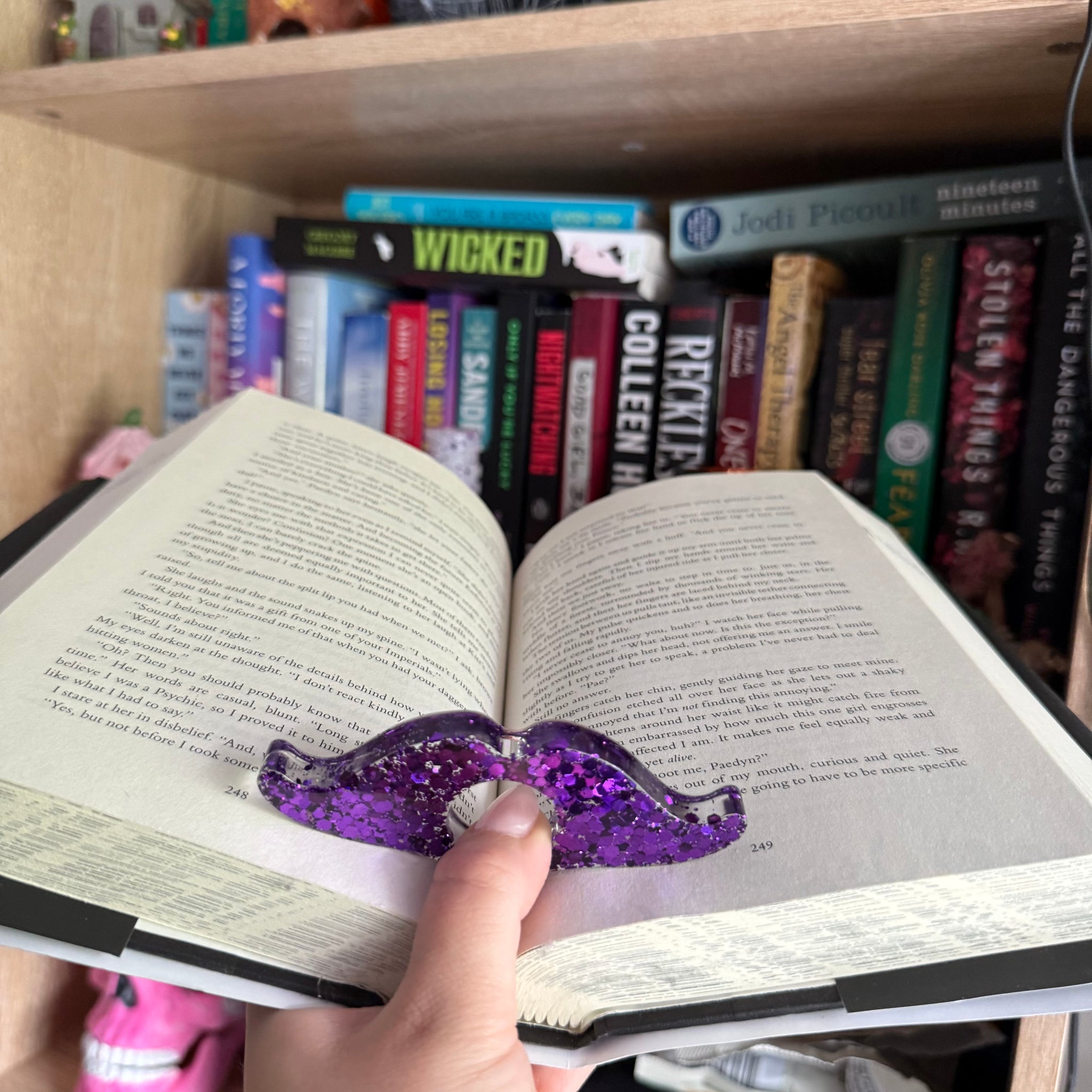 Mustache page holder