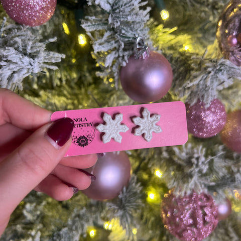 Silvery white snowflake earrings