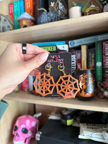 Big Orange halloween spider web huggie earrings