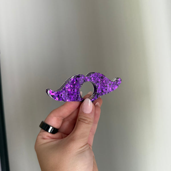 Mustache page holder