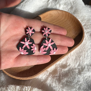 Pink and black floral trapezoid earrings