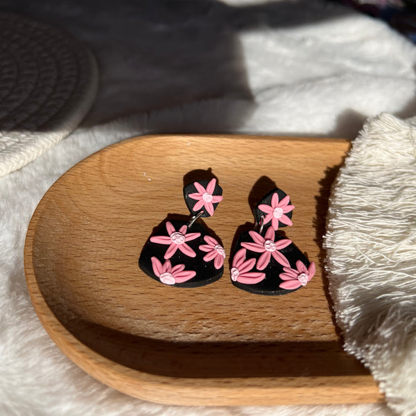 Pink and black floral trapezoid earrings